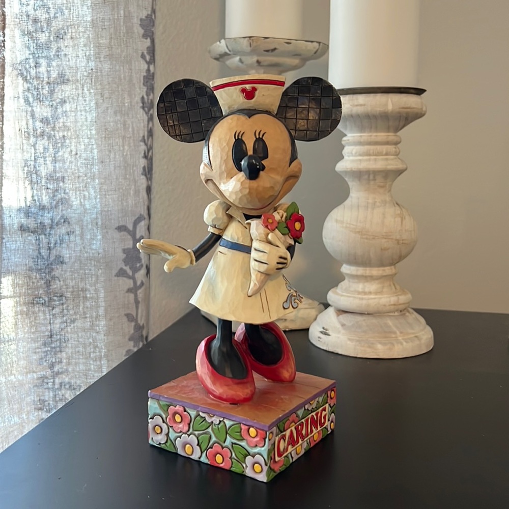 Like new - Minnie Mouse Nurse Collectible by Disney Traditions.